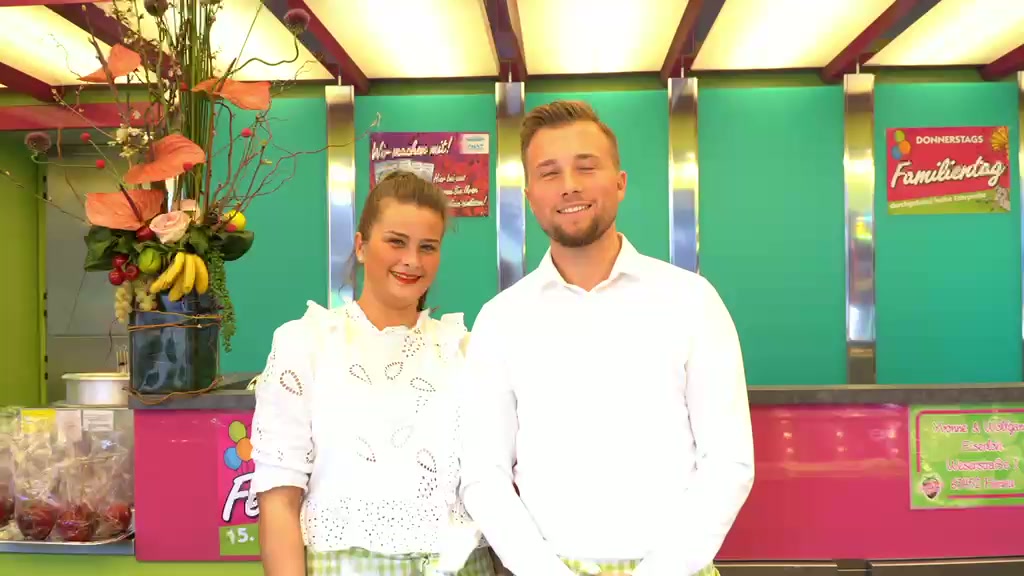 Familie Eiserloh am Schokofrüchte-Stand